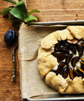 Rustic plum galette with Tutto Sicilia almond pastry cream filling, autumn baking