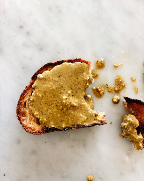 Bread. Pesto. Outside.